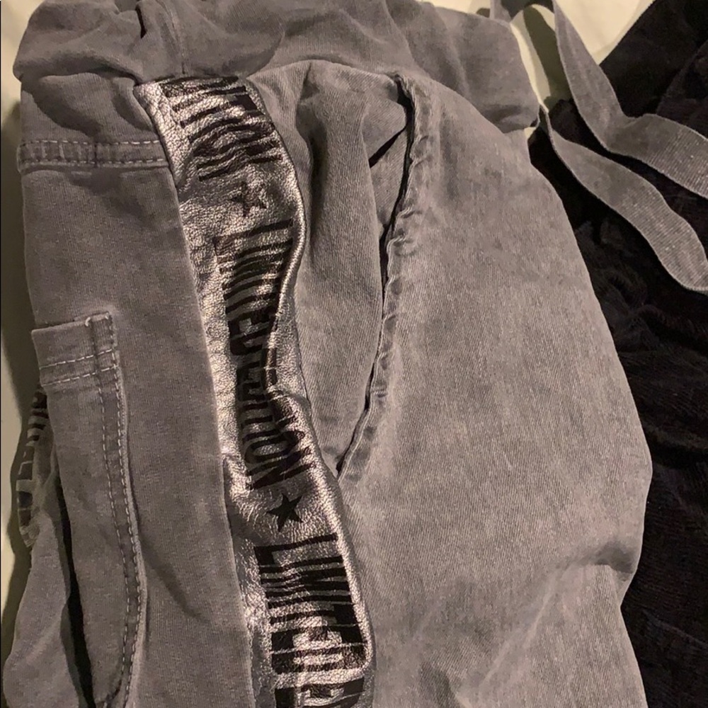 Grey joggers that say "limited edition"